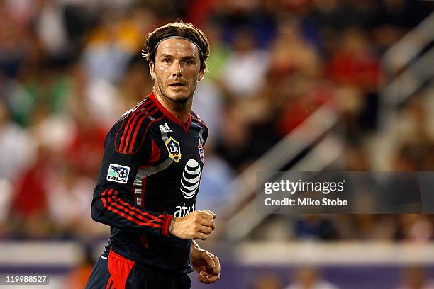 David Beckham of the MLS All-Stars look on while playing against the Manchester United during the second half of the MLS All-Star Game at Red Bull...