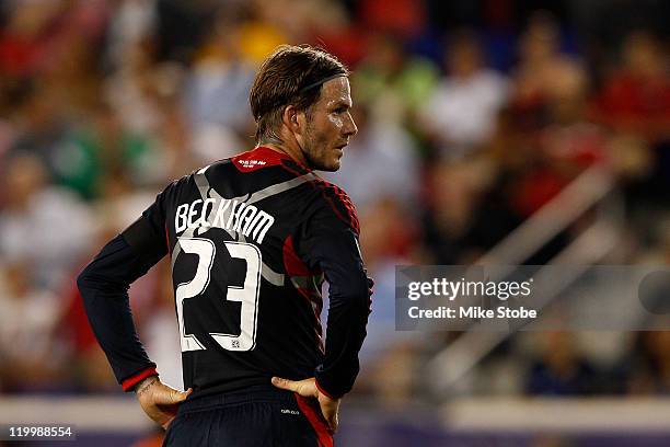 David Beckham of the MLS All-Stars look on while playing against the Manchester United during the MLS All-Star Game at Red Bull Arena on July 27,...