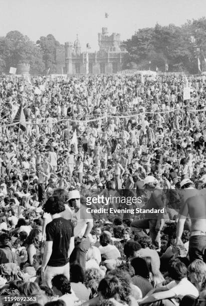 Crowds of festival-goers attending the Knebworth Fair, held in the grounds of Knebworth House in Knebworth, Hertfordshire, England, 21st August 1976.