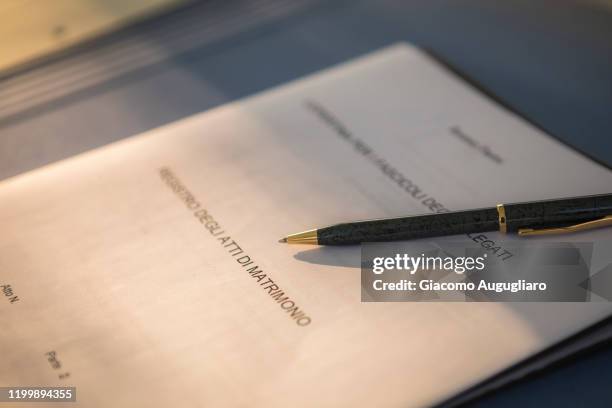 close up of a marriage certificate on a wedding set, lombardy, italy - marriage italian style stock pictures, royalty-free photos & images