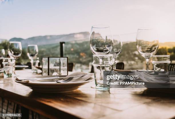 dinner table - patio restaurant stock pictures, royalty-free photos & images