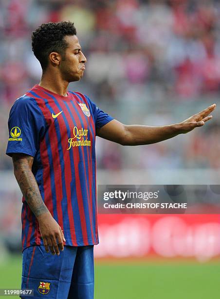 Barcelona's midfielder Thiago Alcantara gestures during their Audi Cup football match FC Barcelona vs SC International de Porto Alegre in Munich,...