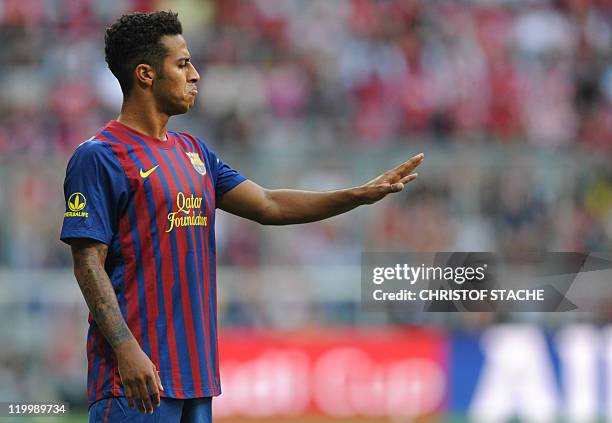 Barcelona's midfielder Thiago Alcantara gestures during their Audi Cup football match FC Barcelona vs SC International de Porto Alegre in Munich,...