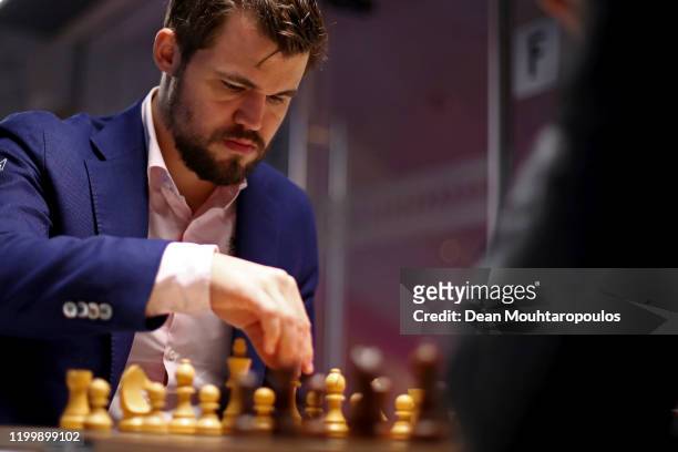 Magnus Carlsen of Norway competes against Daniil Dubov of Russia during the 82nd Tata Steel Chess Tournament held at the home of PSV football club,...