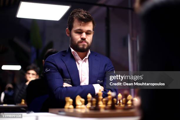 Magnus Carlsen of Norway competes against Daniil Dubov of Russia during the 82nd Tata Steel Chess Tournament held at the home of PSV football club,...