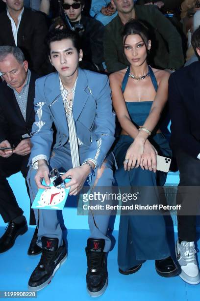 Actor Kris Wu and Model Bella Hadid attend the Louis Vuitton Menswear Fall/Winter 2020-2021 show as part of Paris Fashion Week on January 16, 2020 in...