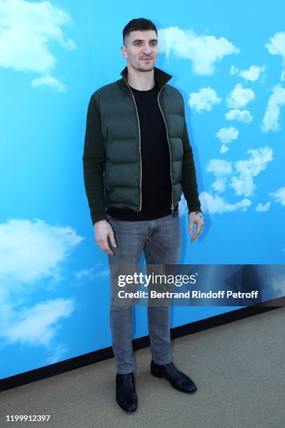 Football player Thomas Meunier attends the Louis Vuitton Menswear Fall/Winter 2020-2021 show as part of Paris Fashion Week on January 16, 2020 in...