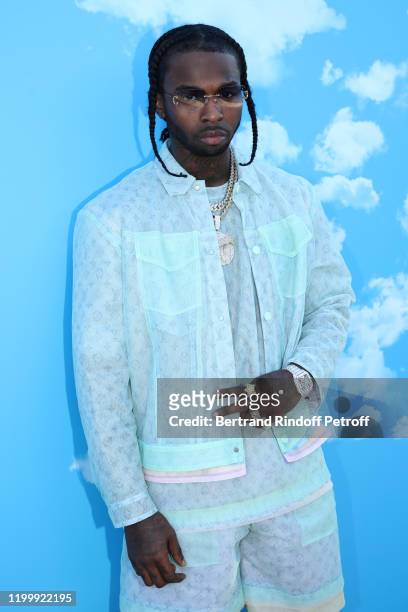Rapper Pop Smoke attends the Louis Vuitton Menswear Fall/Winter 2020-2021 show as part of Paris Fashion Week on January 16, 2020 in Paris, France.