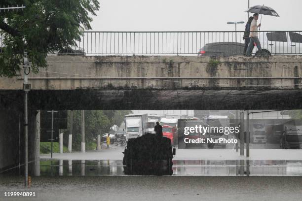 Heavy rain hit the city of Sao Paulo, causing flooding leaving several people stranded, on February 10, 2020. According to the Climate Emergency...