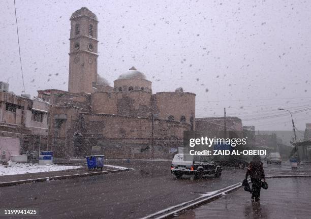 This picture taken on February 10, 2020 amidst a heavy snow storm shows a view of the Roman Catholic Dominican Church of Our Lady of the Hour in the...