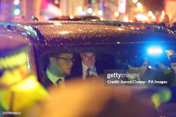 Protesters obstruct Northern Ireland Secretary Julian Smith in a minsterial car as he leaves the Houses of Parliament in London, as their protest...
