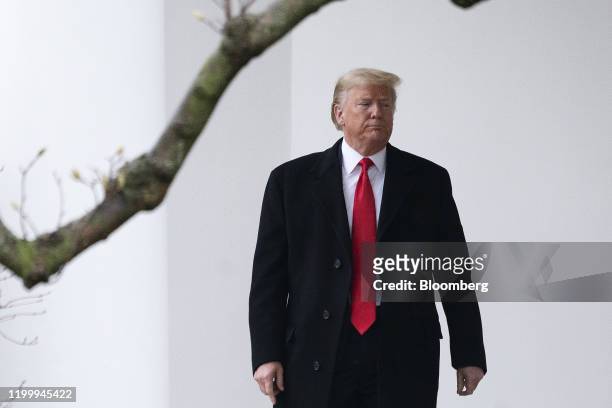 President Donald Trump walks out of the Oval Office of the White House to board Marine One in Washington, D.C., U.S., on Monday, Feb. 10, 2020....