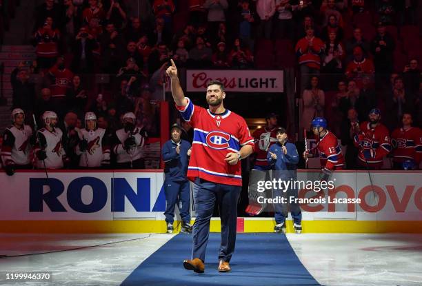 Canadian football player Laurent Duvernay-Tardif greets the fans in a ceremony prior to the NHL game between the Montreal Canadiens and the Arizona...