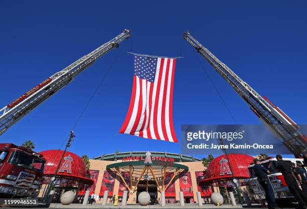 The City of Anaheim fire department displays the America Flag as fans arrive for a memorial service honoring baseball coach John Altobelli, his wife,...