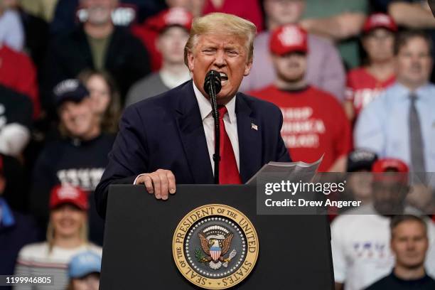 President Donald Trump speaks at a rally at Southern New Hampshire University Arena on February 10, 2020 in Manchester, New Hampshire. New Hampshire...