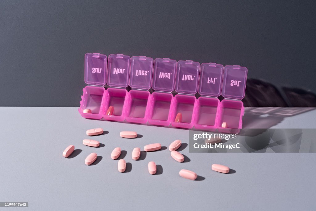 Pills Spilling Form Pill Organizer