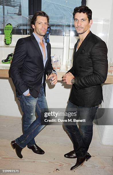 Louis Dowler and David Gandy attend a private view of works by five leading artists who have created pieces inspired by Reebok's Zig Tech technology...