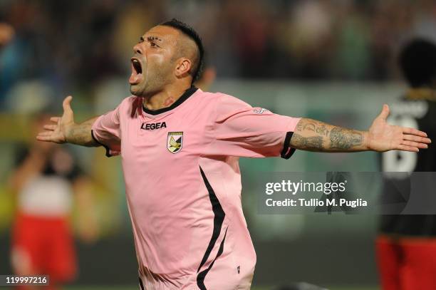 Fabrizio Miccoli of Palermo celebrates after scoring the second equalizing goal during the Europa League third qualifying round between US Citta di...