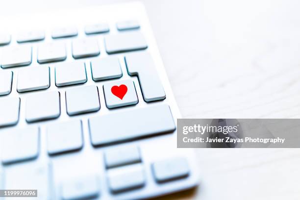 Heart Keyboard Symbol Fotografías e imágenes de stock - Getty Images