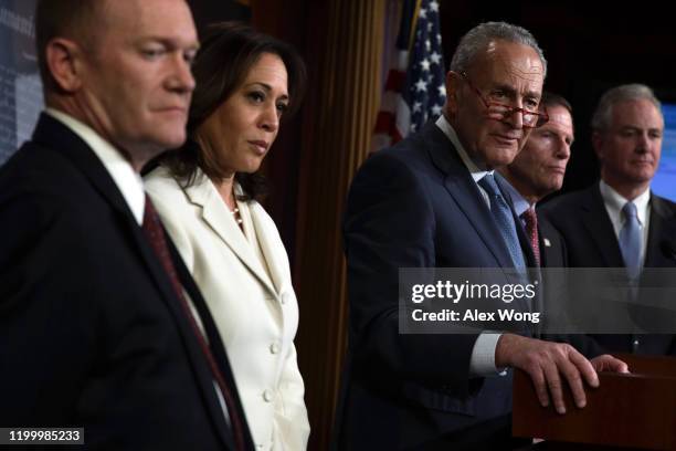 Senate Minority Leader Sen. Chuck Schumer speaks as Sen. Chris Coons , Sen. Kamala Harris , Sen. Richard Blumenthal and Sen. Chris Van Hollen listen...