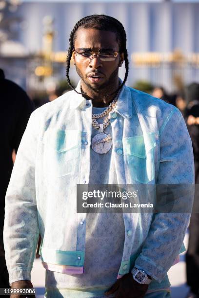 Pop Smoke attends the Louis Vuitton Menswear Fall/Winter 2020-2021 show as part of Paris Fashion Week on January 16, 2020 in Paris, France.