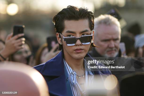 Kris Wu wears sunglasses, outside Vuitton, during Paris Fashion Week - Menswear Fall / Winter 2020-2021 on January 16, 2020 in Paris, France.