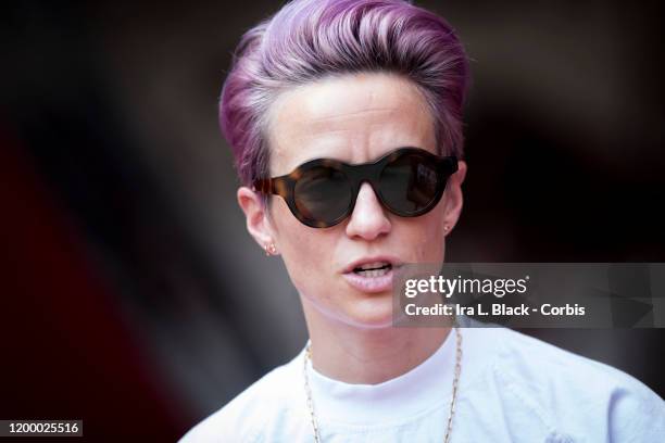 Megan Rapinoe of Seattle Reign FC with pink hair and sunglasses on the sideline due to an injury before the National Women's Soccer League match...