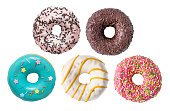 Set of various colorful donuts isolated on white background.