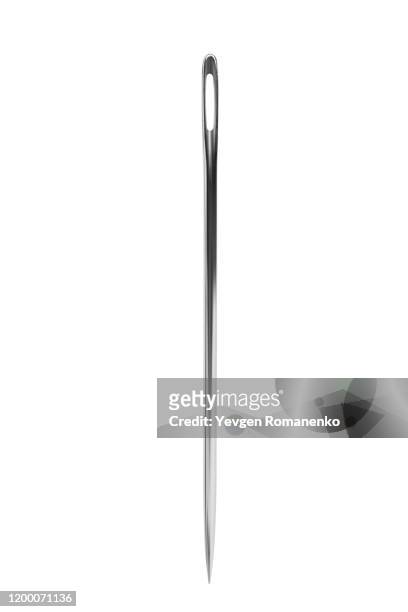 sewing needle isolated on a white background. macro shot - sewing needle stock pictures, royalty-free photos & images