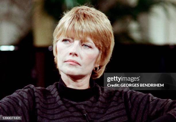 In this file photograph taken on November 10 French cartoonist Claire Bretecher poses during a television show on French channel A2 in Paris. -...