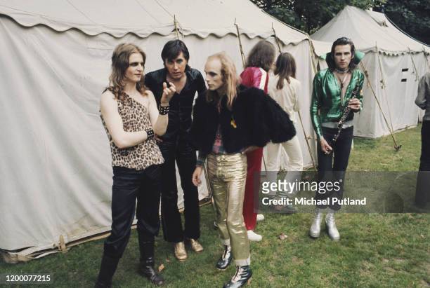 English glam rock group Roxy Music backstage at the Crystal Palace Garden Party in London, 29th July 1972. Members of the band are, from left to...