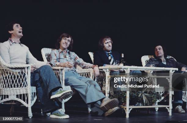 Members of British comedy group Monty Python perform a sketch together on stage at the New York City Center, New York, 20th April 1976. Left to...