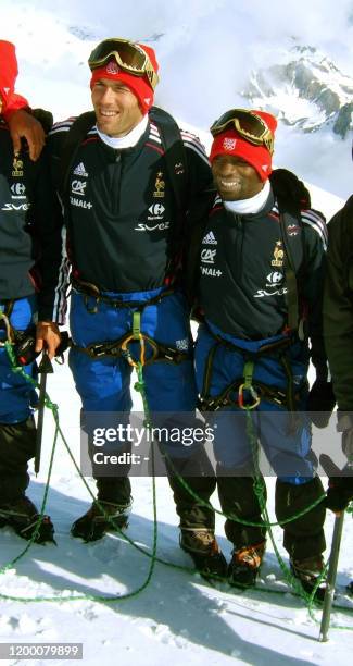 French midfielder Zinédine Zidane poses with his Claude Makelele as they climb the Tignes' glacier, 24 May 2006 in Tignes, after spending a nigth a...