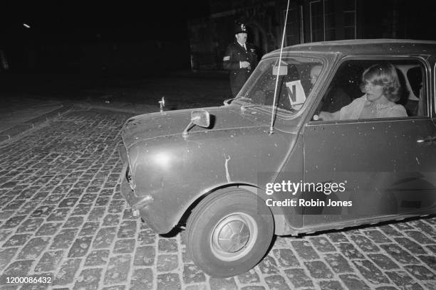 Camilla Parker-Bowles in the front passenger seat of a car in April 1976.