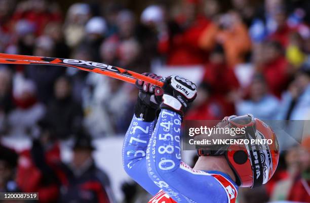 Swiss Didier Cuche celebrates in the finish area of the Men's FIS Alpine World Cup Super G event in Val Gardena, 14 December 2007. Cuche won the race...