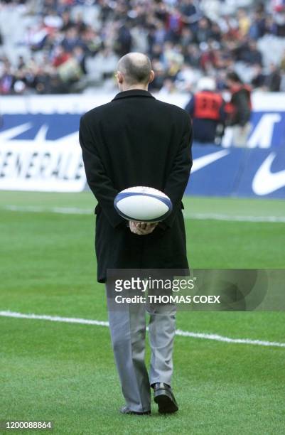 France's team coach Bernard Laporte waits on the ground before the 6 Nations rugby Tournament match between France and Ireland 18 March 2000 at the...