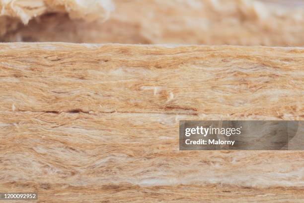 close-up of insulation wool. mineral wool. - isolatiemateriaal stockfoto's en -beelden