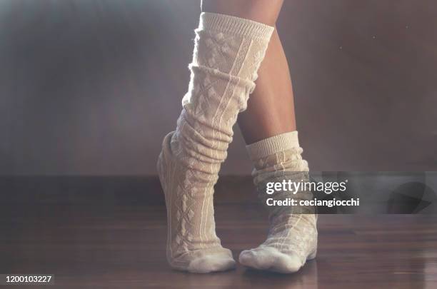 close-up of a teenage girl's legs wearing knee-highs - kneesock stock pictures, royalty-free photos & images