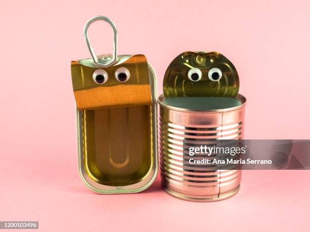 concept of love, romanticism and diversity. two open tin cans with eyes - cuisine humour stock pictures, royalty-free photos & images