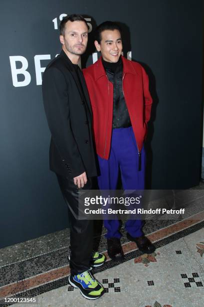 Artistic Director of Berluti Kris Van Assche and actor Eddie Peng pose after the Berluti Menswear Fall/Winter 2020-2021 show as part of Paris Fashion...