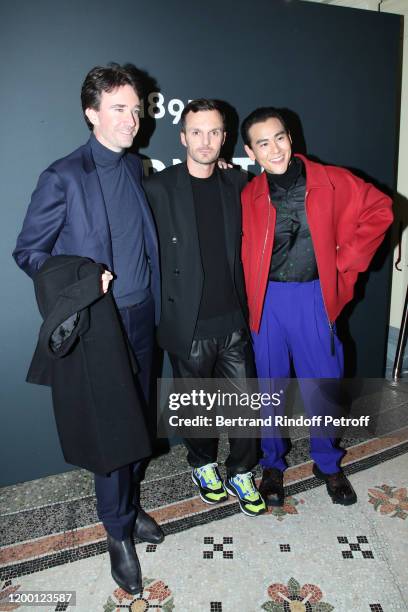 General manager of Berluti Antoine Arnault, Artistic Director of Berluti Kris Van Assche and actor Eddie Peng pose after the Berluti Menswear...