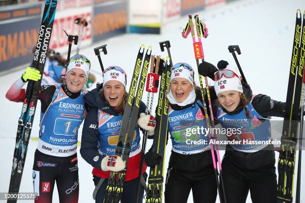 Karoline Offigstad Knotten, Ingrid Landmark Tandrevold, Tiril Eckhoff and Marte Olsbu Roeiseland of Norway celebrates victory after winning the Women...