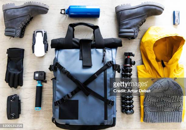 arranging photographic material for outdoor adventure taken from above. - knolling tools stock pictures, royalty-free photos & images