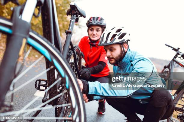 let's fix your bicycle, my dear - bike tyre stock pictures, royalty-free photos & images