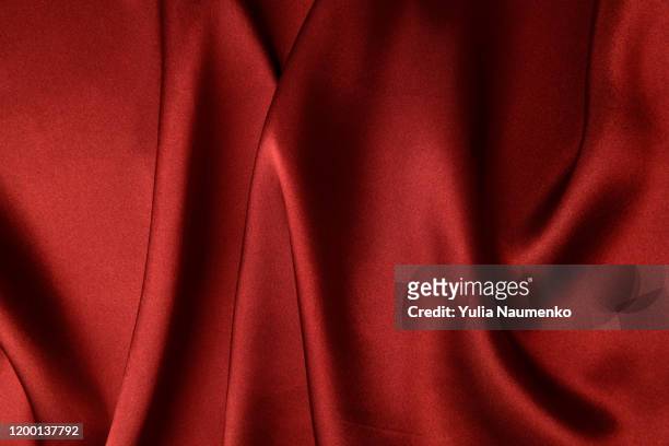 abstract background luxury cloth. wavy folds of grunge red silk texture satin velvet material or luxurious red silk as background, folds of red silky fabric. - velvet photos et images de collection