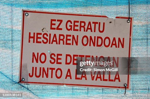 Basque Signage Construction Site Warning Sign In Basque And Spanish Languages Stating ...