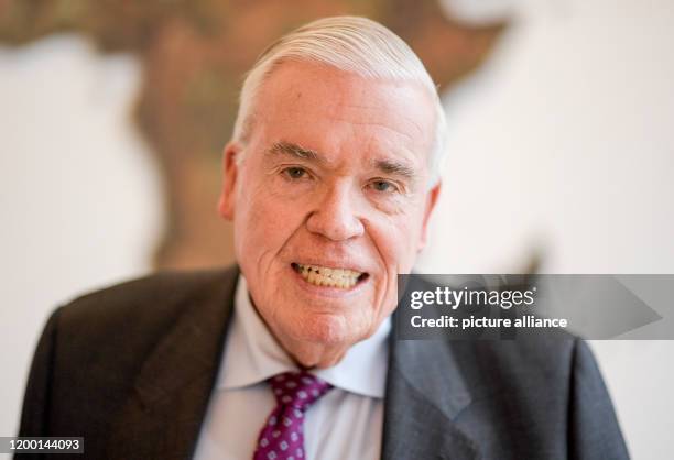 February 2020, Hamburg: Klaus-Michael Kuehne, entrepreneur, stands in front of a map of the world at the headquarters of Kuehne und Nagel AG. Federal...