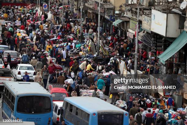 Picture shows on February 11, 2020 a general view of al-Atba district of the Egyptian capital Cairo. - Egypt's population has reached 100 million,...