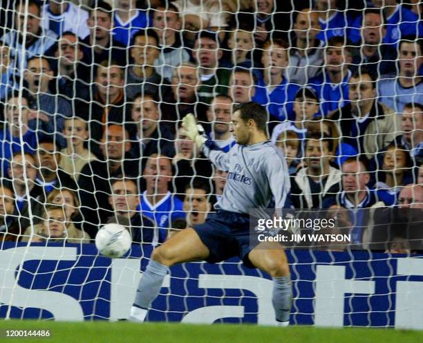 Chelsea's goal keeper Carlo Cudicini watches the ball go into the goal on a kick from Besiktas' Sergen Yalcin during their Champions League match at...