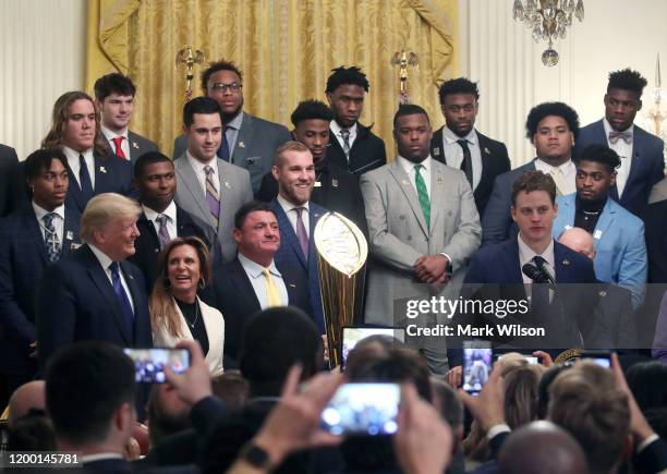 Heisman trophy winning quarterback Joe Burrow speaks as U.S. President Donald Trump honors the Louisiana State University football team in the East...